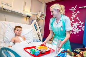 Small boy in hospital bed