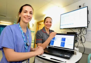 Nurses with new patient information system